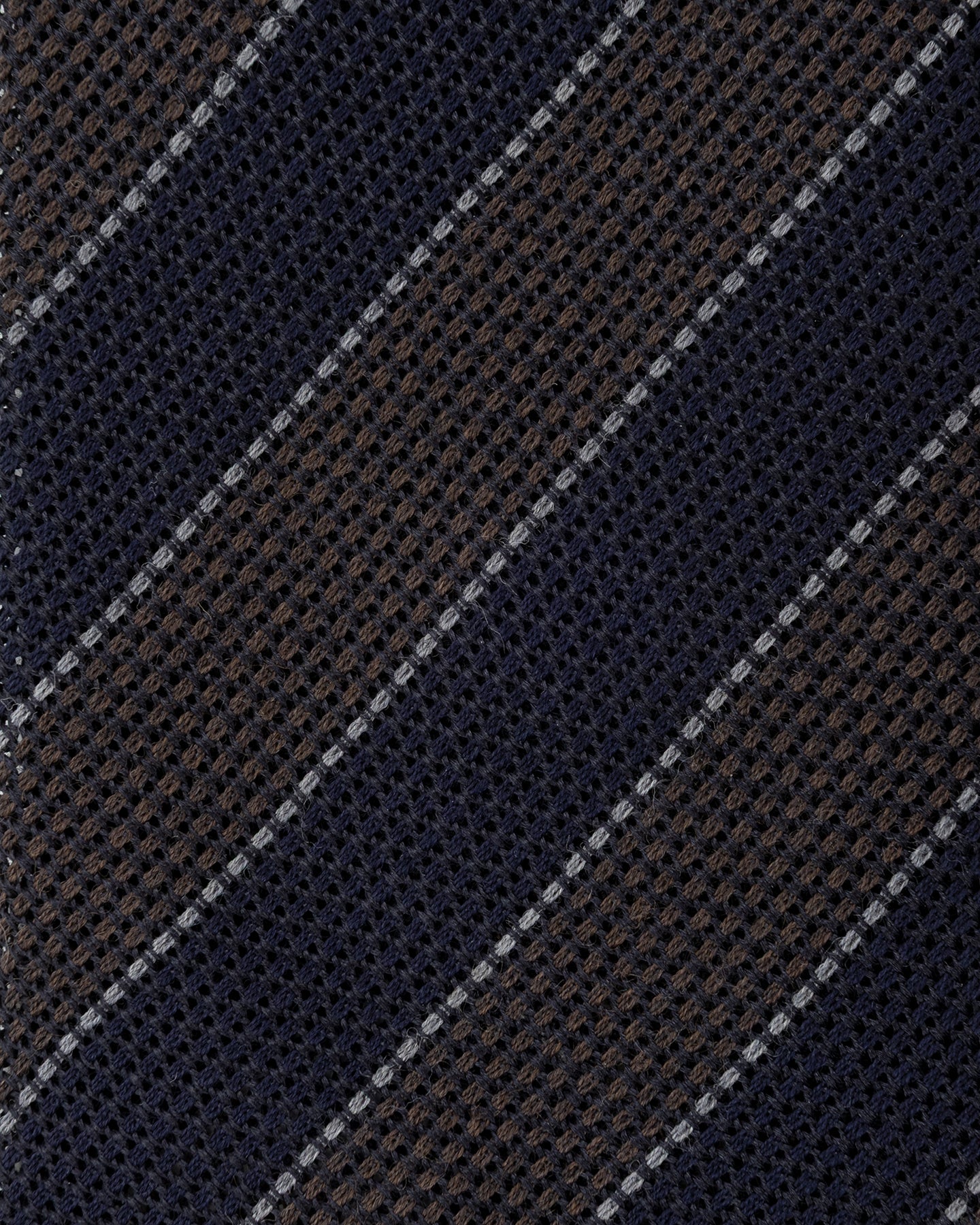 Close-up of navy and brown grenadine weave