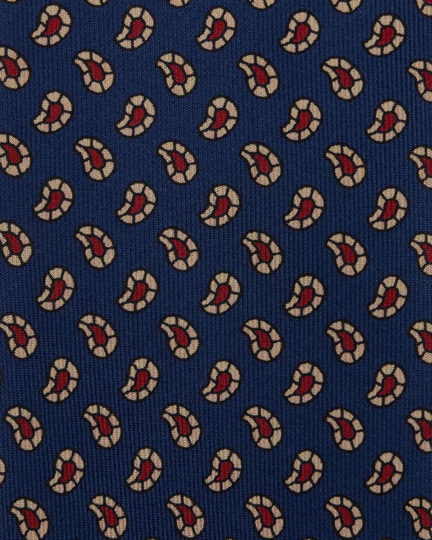 Navy Ancient Madder tie with small paisley pattern in shades of cream and red.