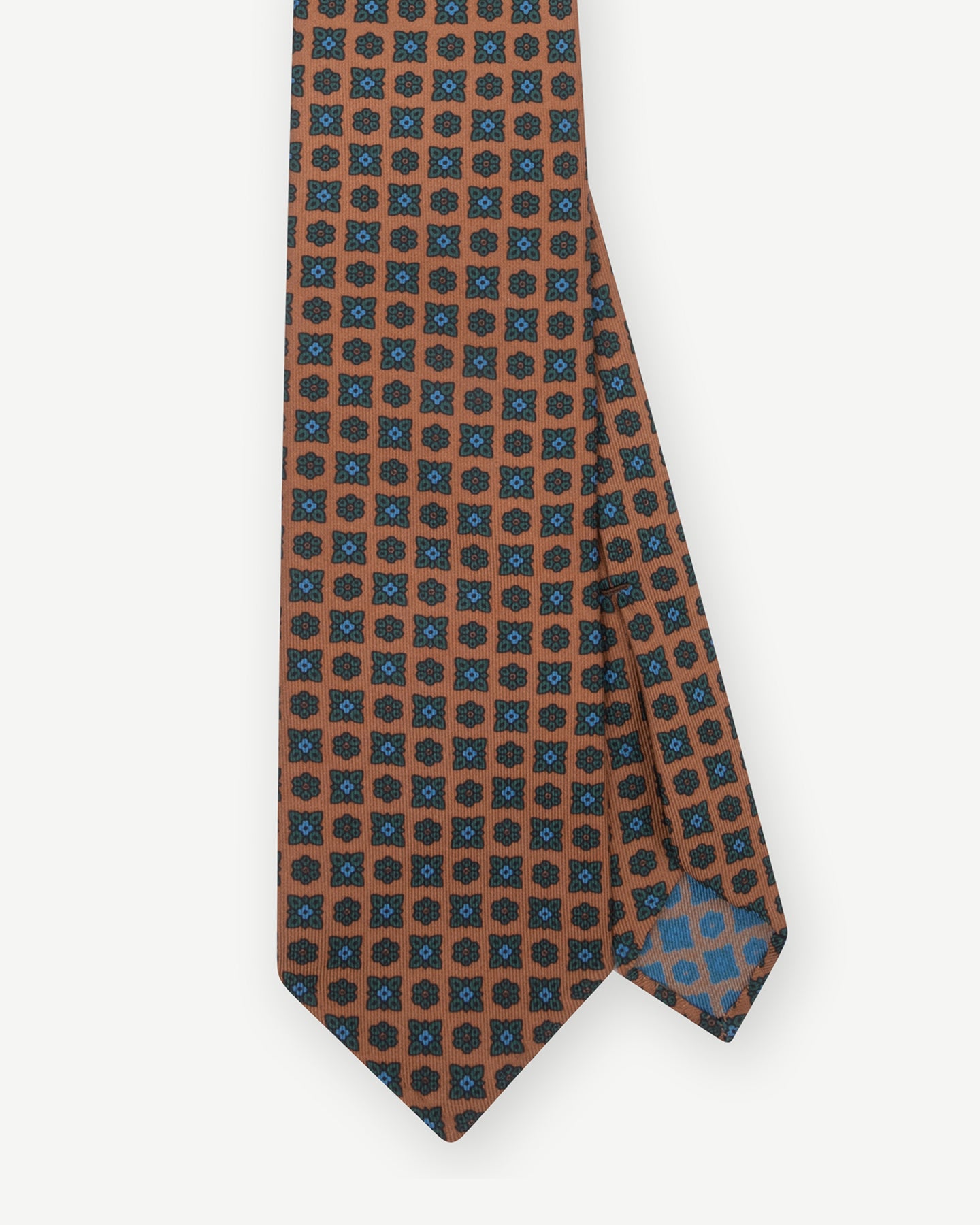 Orange Ancient Madder tie with small floral pattern