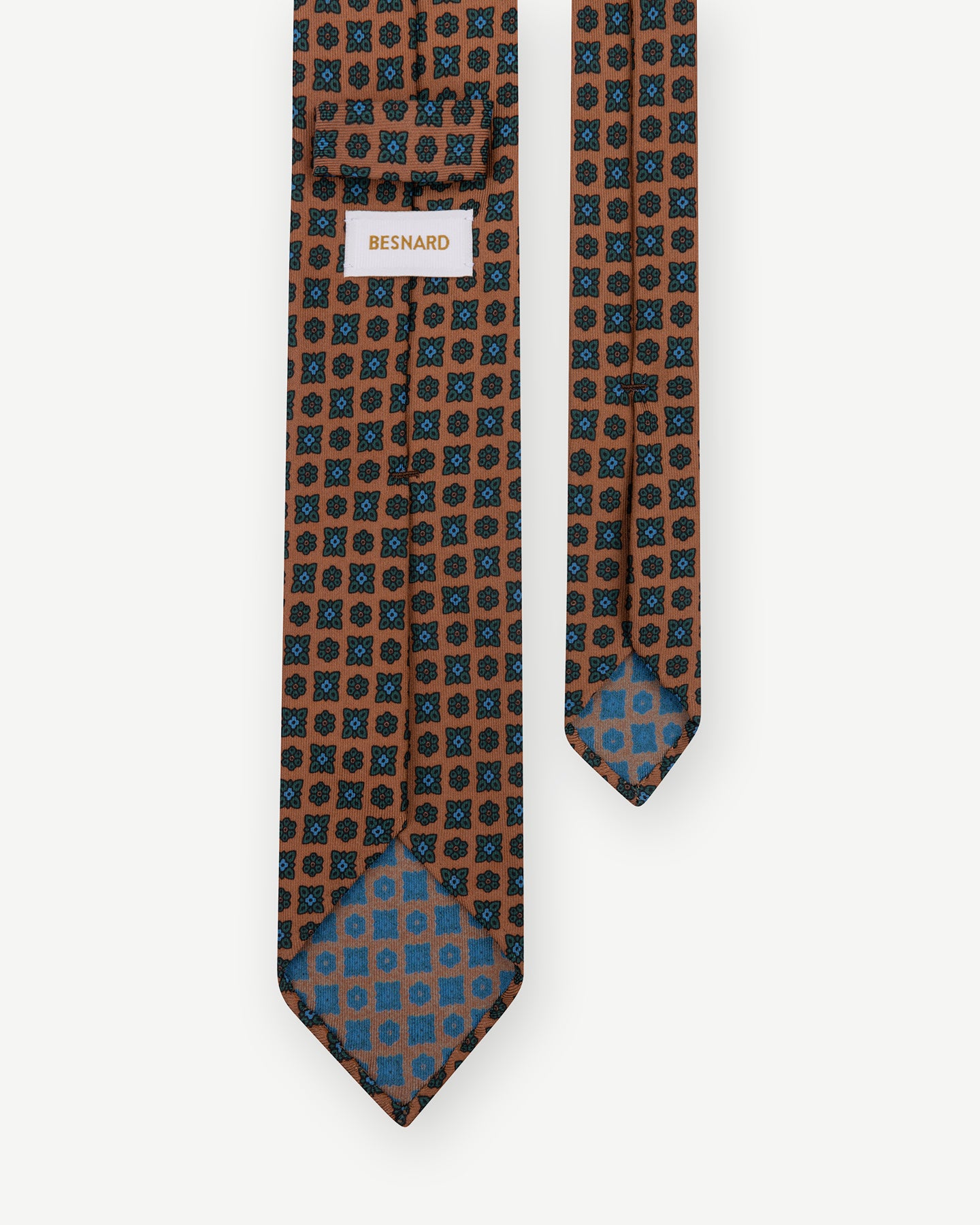 Orange Ancient Madder tie with small floral pattern and handrolled blades