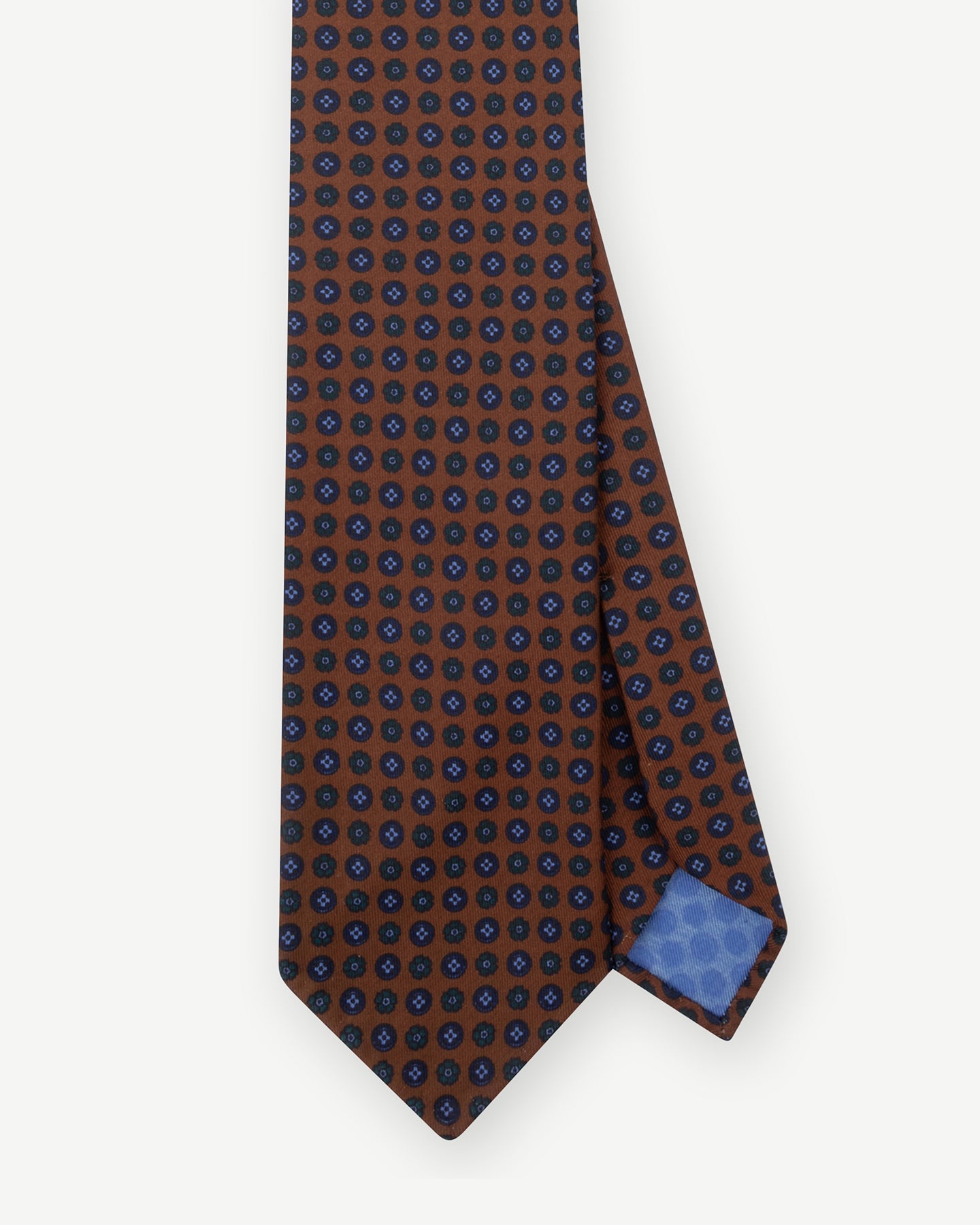 Rust Ancient Madder tie with small floral pattern