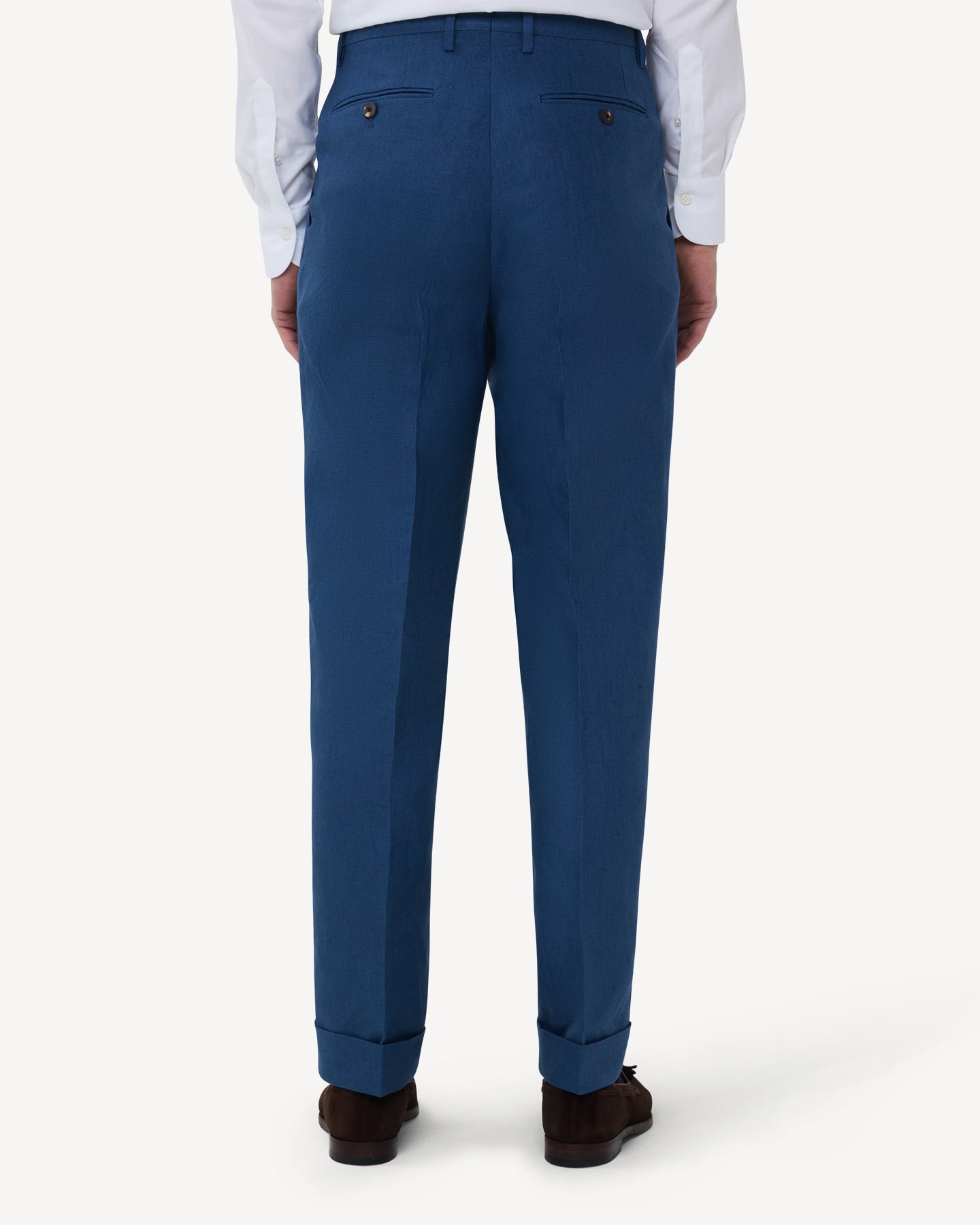 The back of blueberry linen trousers with double pleats and belt loops