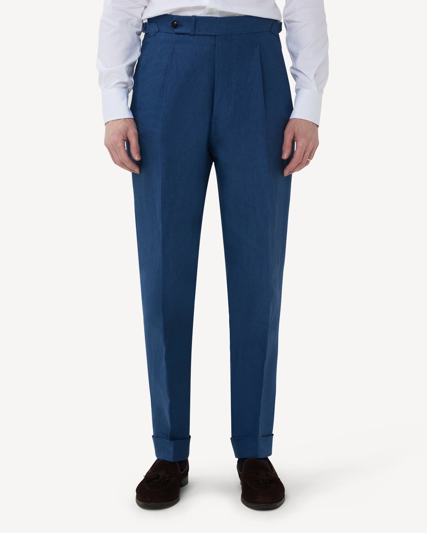 The front of blueberry linen trousers with single pleats and side adjusters