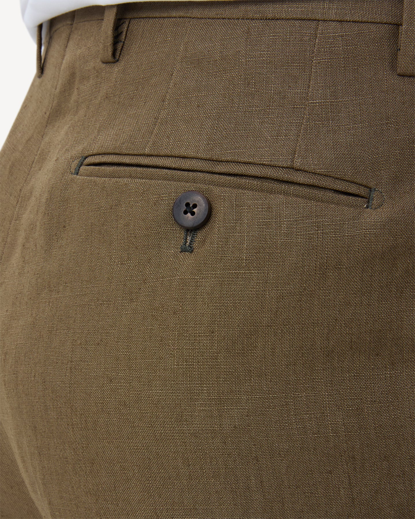 Olive brown linen trousers with horn buttons
