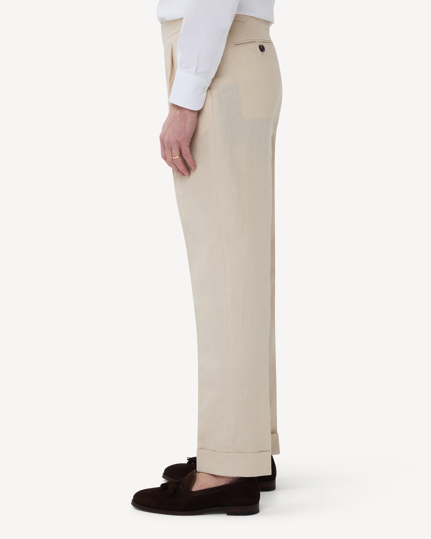 The side of stone linen trousers with single pleats and side adjusters