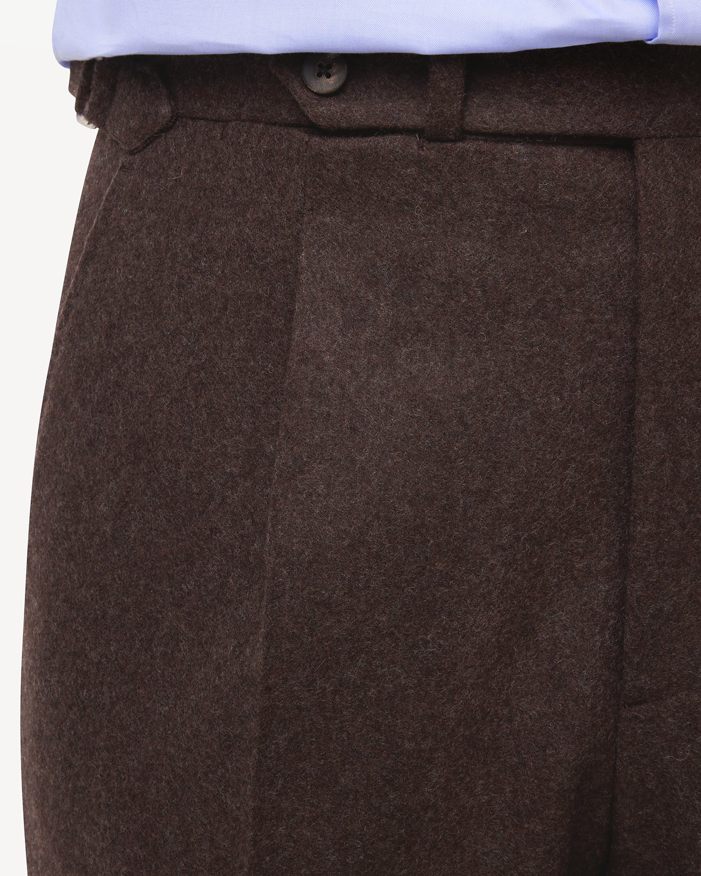 Dark brown flannel trousers with extended waistband