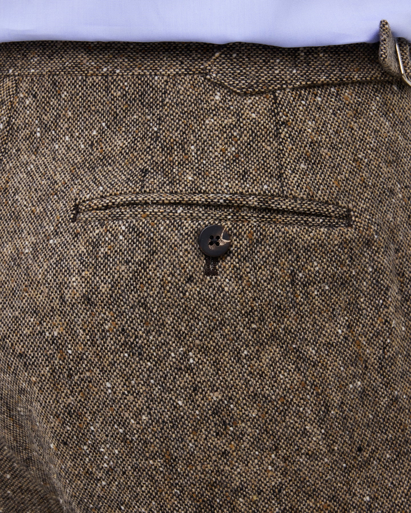 Light brown Donegal tweed trousers with horn buttons