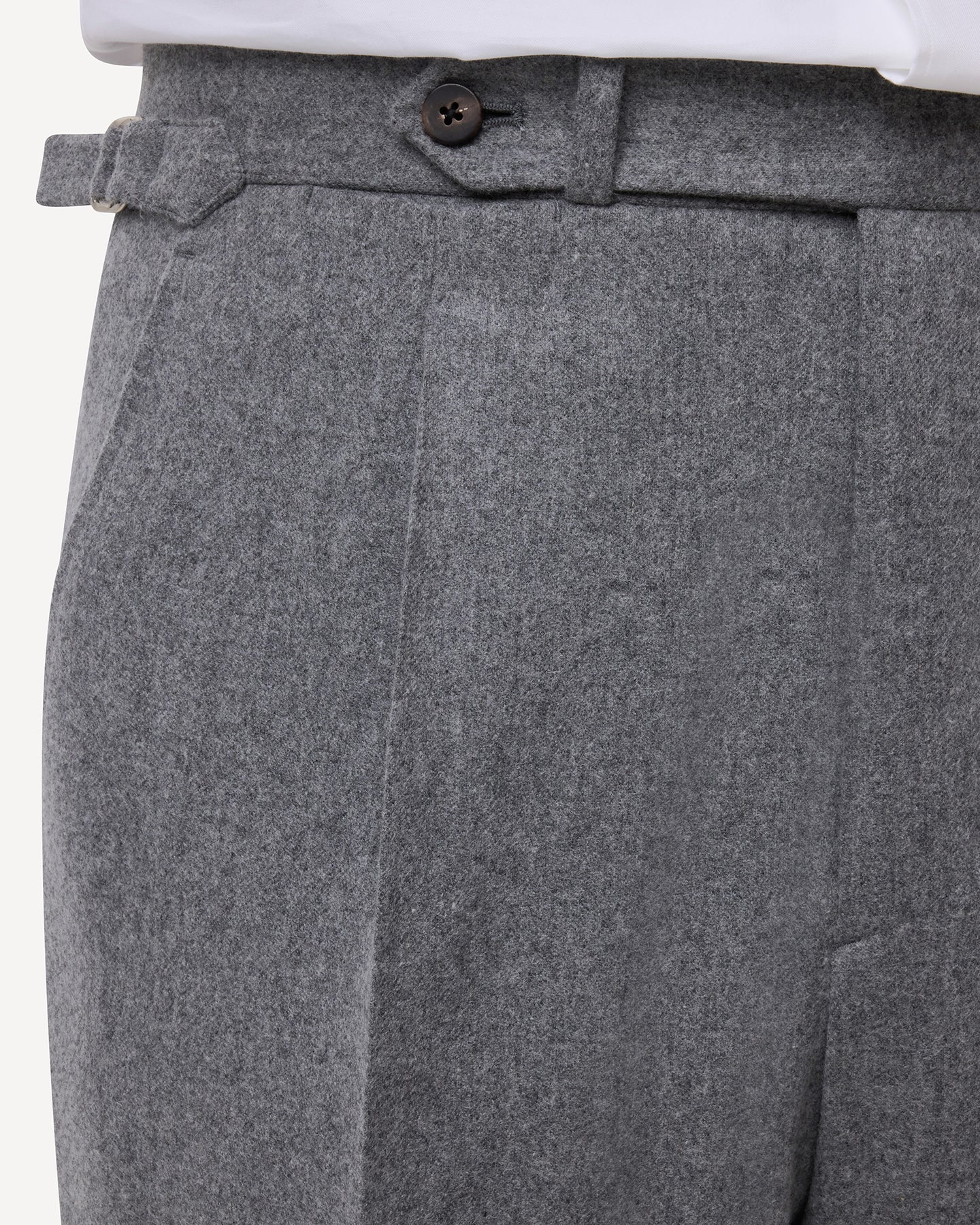 Light grey flannel trousers with extended waistband