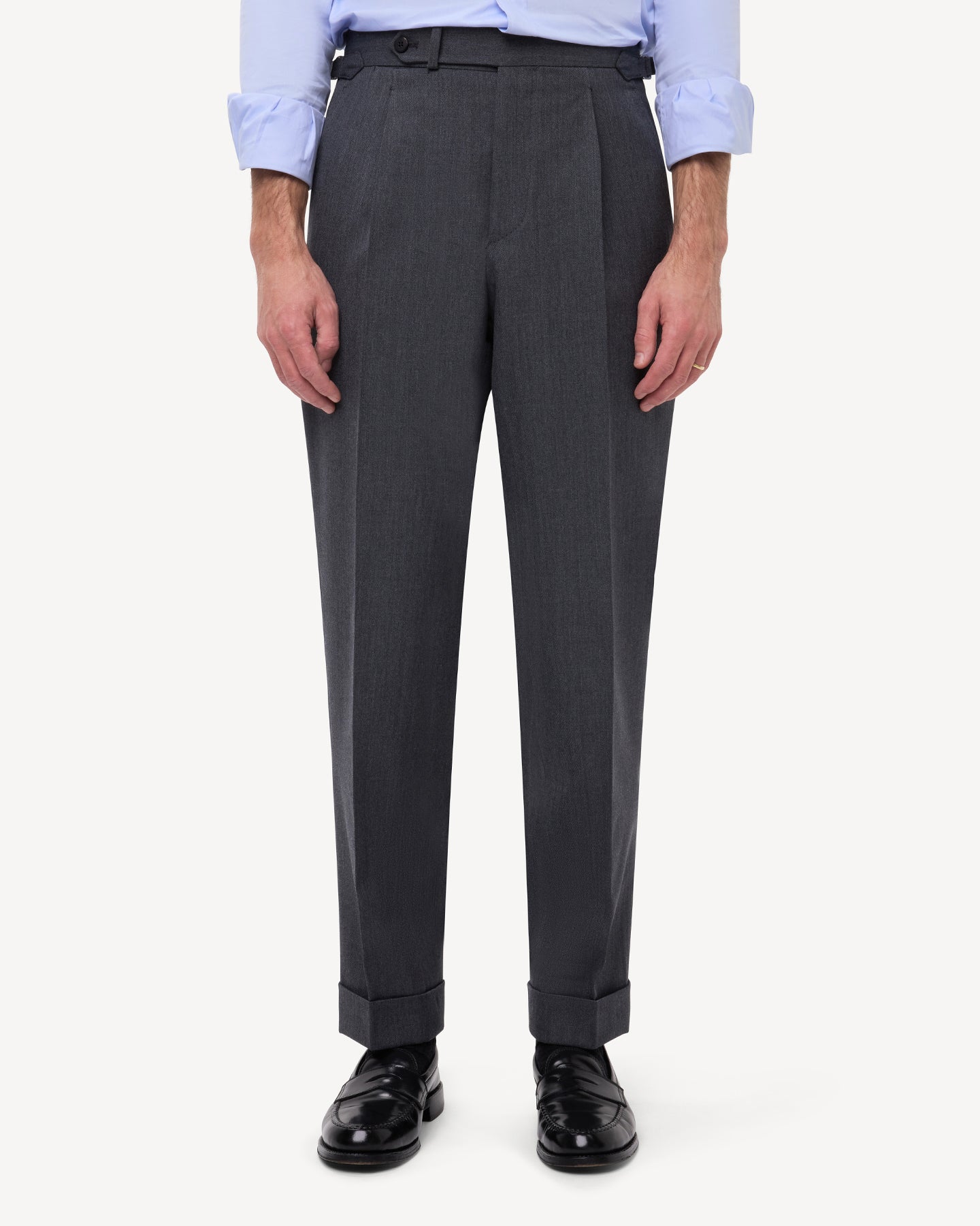 Front view of mid grey cavalry twill trousers with single pleats and side adjusters