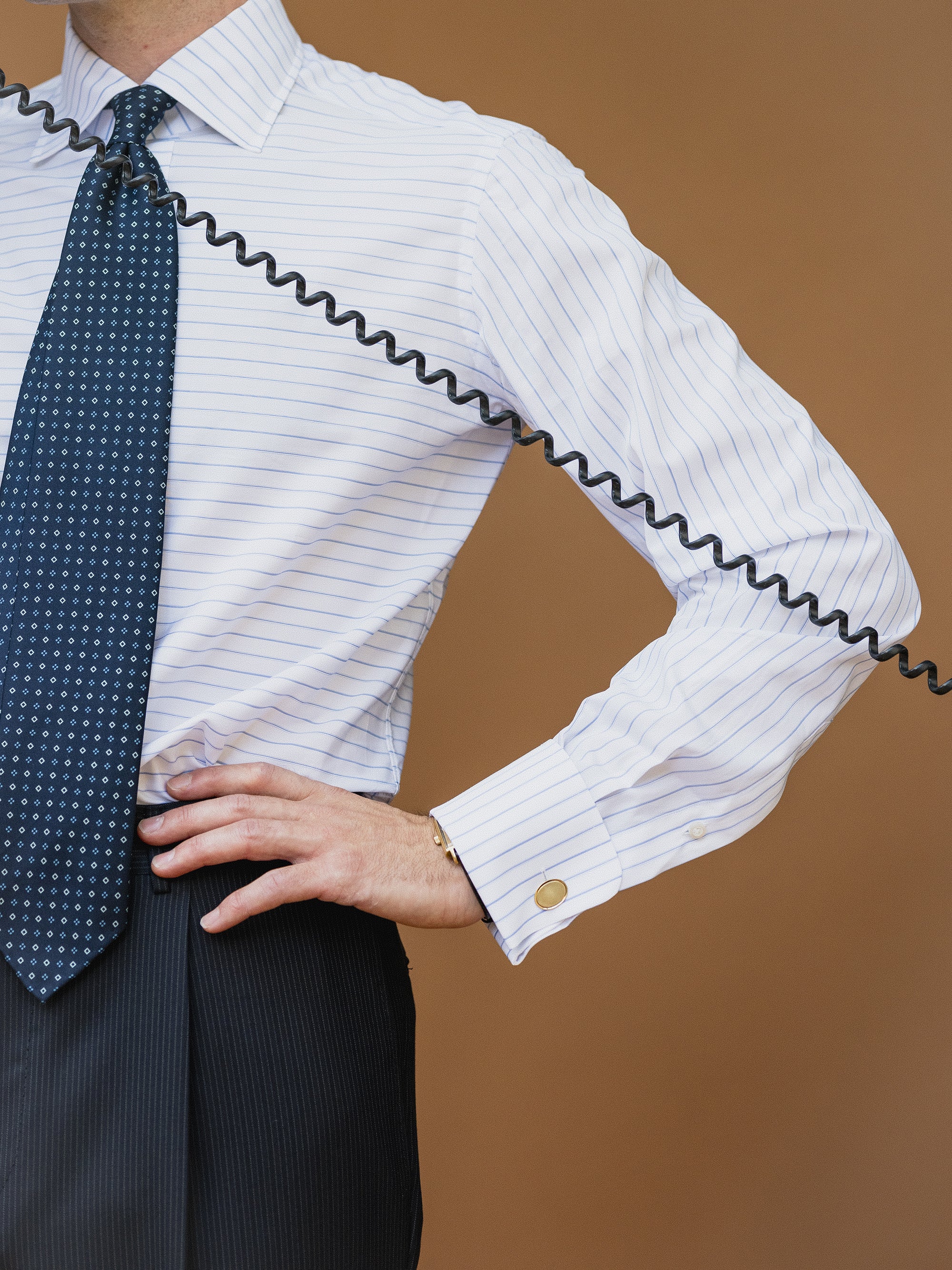 Man wearing a horizontal striped poplin shirt as worn by Gordon Gekko in Wall Street